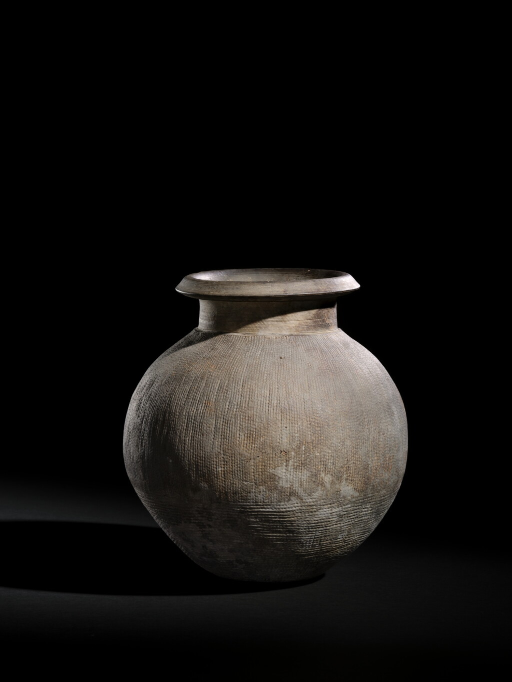 View full screen - View 1 of Lot 8024. The Sir Percival David pottery jar, Zhou dynasty; imperially inscribed with Qianlong’s poem Yong Tao Zun (“Ode to a Pottery Zun”), very likely composed for this vessel and dated to the summer of the jichou year (1769) | 周 印紋灰陶尊 刻清高宗御製詩〈詠陶尊〉 《乾隆己丑夏御題》款 「德充符」印.