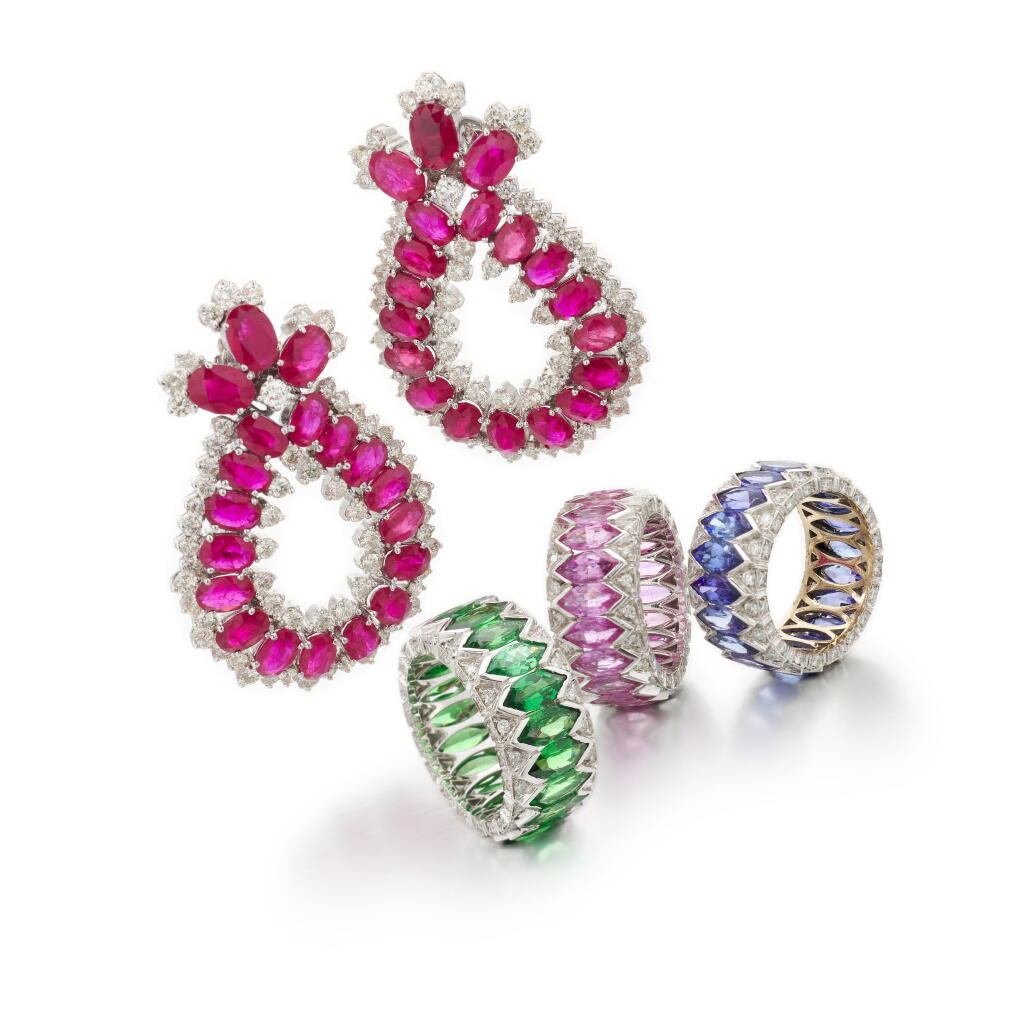 View full screen - View 1 of Lot 163. Rubini, tanzanite, pink sapphire, tzavorite and diamond rings and a pair of ear clips ( Anelli e orecchini in rubini, tanzaniti, zaffiri rosa e tzavoriti) .