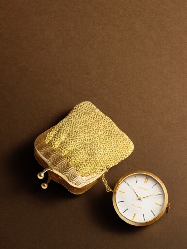 View full screen - View 1 of Lot 2269. New York retailed | A most unusual and extremely rare yellow gold lady’s evening purse containing an 8-day watch, Circa 1963-64 .