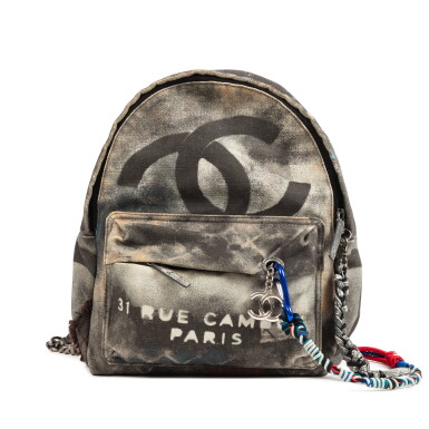 View full screen - View 1 of Lot 400. Multicolor Canvas Graffiti Art School Backpack Silver Hardware, 2014.