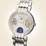 A platinum semi-skeletonized perpetual calendar wristwatch with bi-retrograde day and date, moon phases, and bracelet, Circa 1990