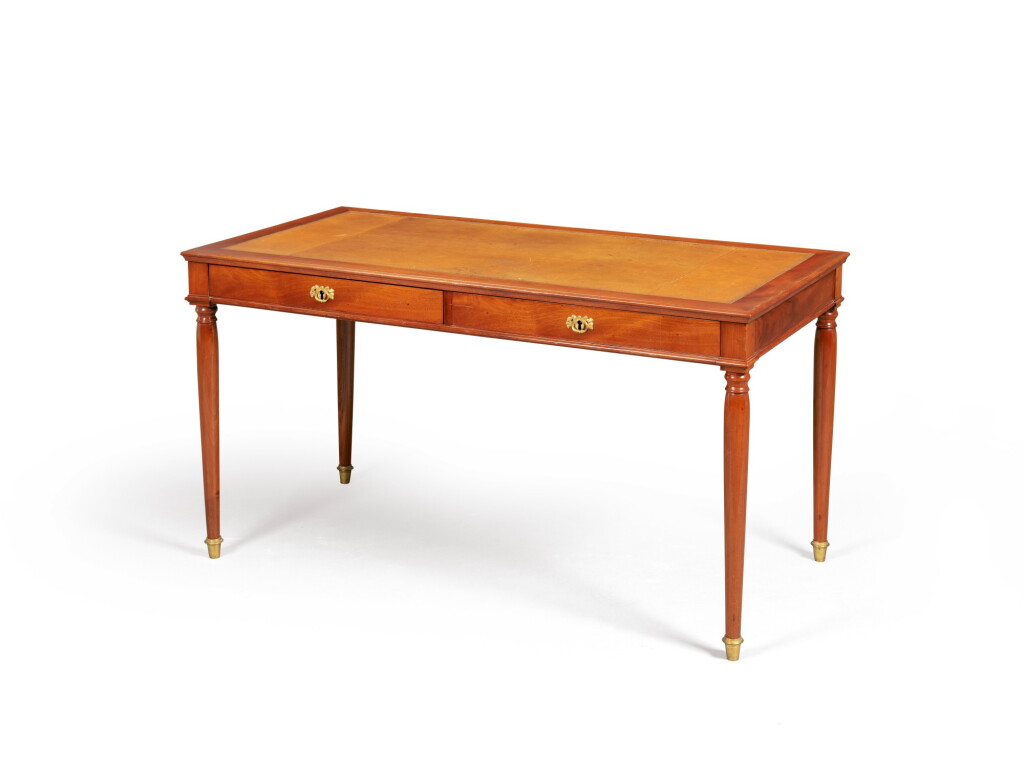 View full screen - View 1 of Lot 2. A late Louis XVI mahogany bureau plat, circa 1790, stamped "P. GARNIER", circa 1790 .