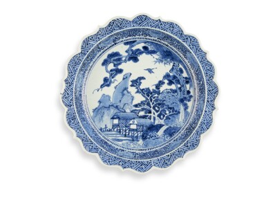 View full screen - View 1 of Lot 2102. A large porcelain dish, Arita ware, Hizen, Edo period, mid-17th century | 染付山水図輪花大皿 肥前 有田窯 江戸時代前期 17世紀中頃 .