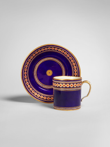 View full screen - View 1 of Lot 683. A Sèvres Porcelain 'Jeweled' Bleu Nouveau-Ground Cup and Saucer (Gobelet litron et soucoupe), circa 1780-82.