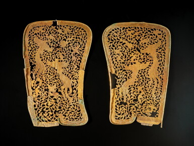 View full screen - View 1 of Lot 824. A rare pair of reticulated gilt-silver 'phoenix' crown ornaments, Liao dynasty | 遼 銀鎏金透空穿花鳳紋冠翅一對.