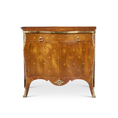 View full screen - View 1 of Lot 107. A George III Gilt Lacquered Bronze and Brass Mounted Harewood, Kingwood and Marquetry Serpentine Commode in the manner of John Cobb, Circa 1770.