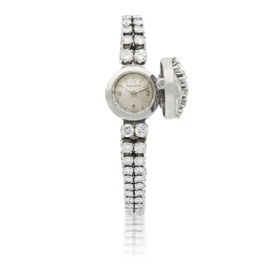 View full screen - View 1 of Lot 564. JAEGER-LECOULTRE | PLATINUM AND DIAMOND-SET BRACELET WATCH CIRCA 1955.