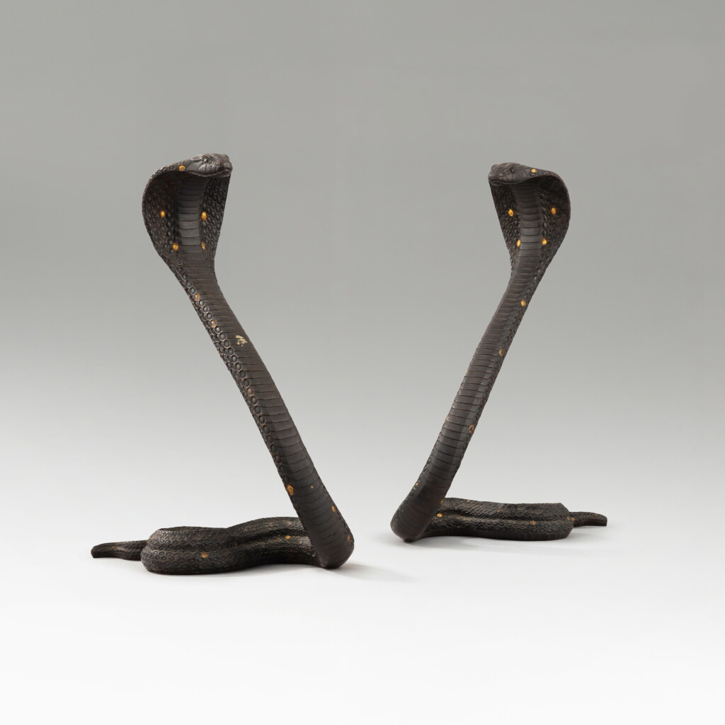 View full screen - View 1 of Lot 52. Paire de Naja dressés.