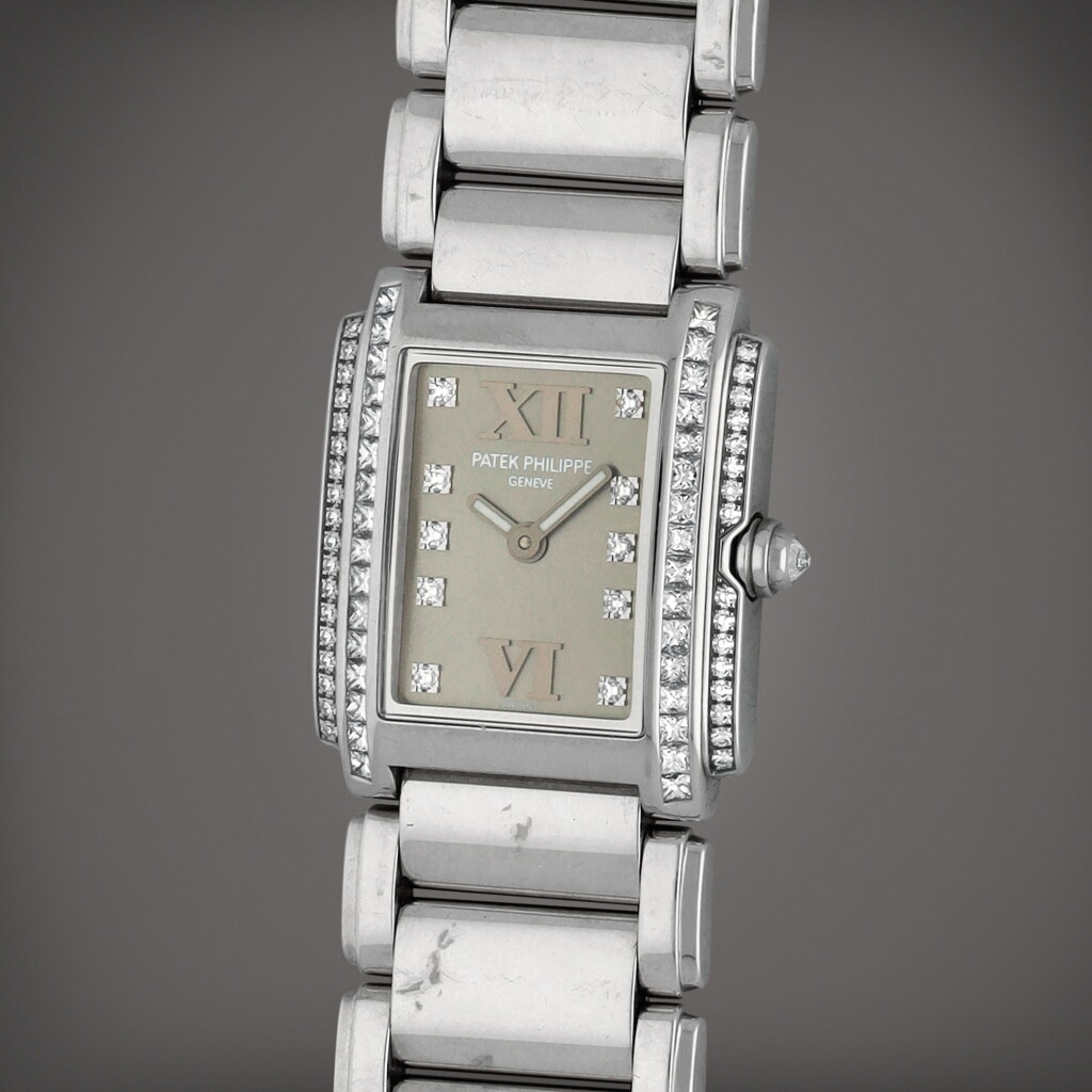 View full screen - View 1 of Lot 267. Twenty-4, Reference 4908/20 | A white gold and diamond-set wristwatch with bracelet | Circa 2004.