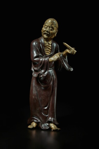 View full screen - View 1 of Lot 119. A large parcel-gilt bronze figure of a Luohan, Qing dynasty, Qianlong period.