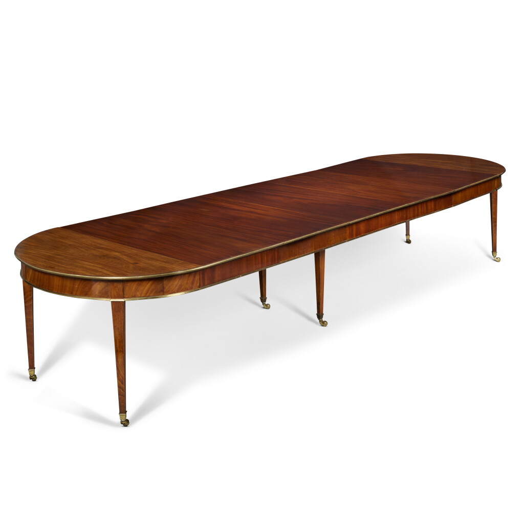 View full screen - View 1 of Lot 327. A Late Louis XVI Brass Mounted Mahogany Dining Table, Circa 1800.