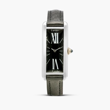 View full screen - View 1 of Lot 2388. Tank J.J.C. Allongée | An extremely rare white gold elongated rectangular wristwatch with black dial and original white and pink gold deployant buckle, Circa 1992.
