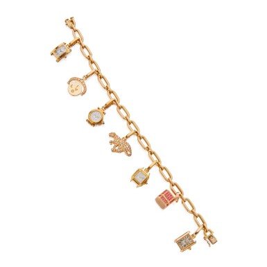 View full screen - View 1 of Lot 241. GOLD AND GEM-SET CHARM BRACELET, CARTIER.