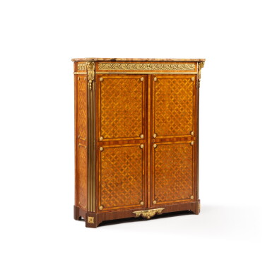 View full screen - View 1 of Lot 305. A Louis XVI gilt-bronze mounted, tulipwood and amaranth geometrical marquetry armoire, circa 1780 | Armoire en marqueterie géométrique de bois de rose, amarante et monture de bronze doré d'époque Louis XVI, vers 1780.