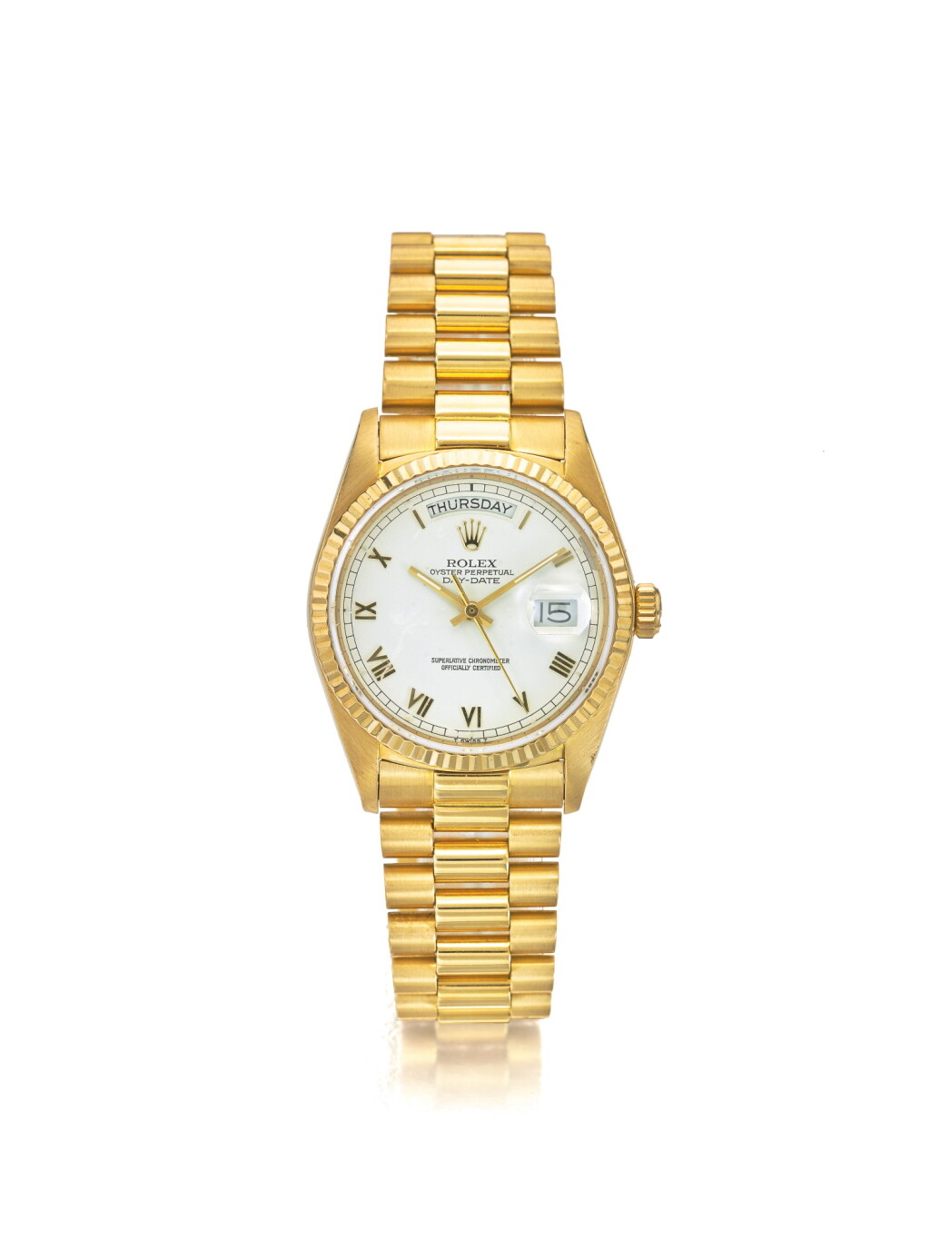 View full screen - View 1 of Lot 54. ROLEX | REF 18038 DAY-DATE, A YELLOW GOLD AUTOMATIC CENTER SECONDS WRISTWATCH WITH DAY DATE AND BRACELET CIRCA 1985 .