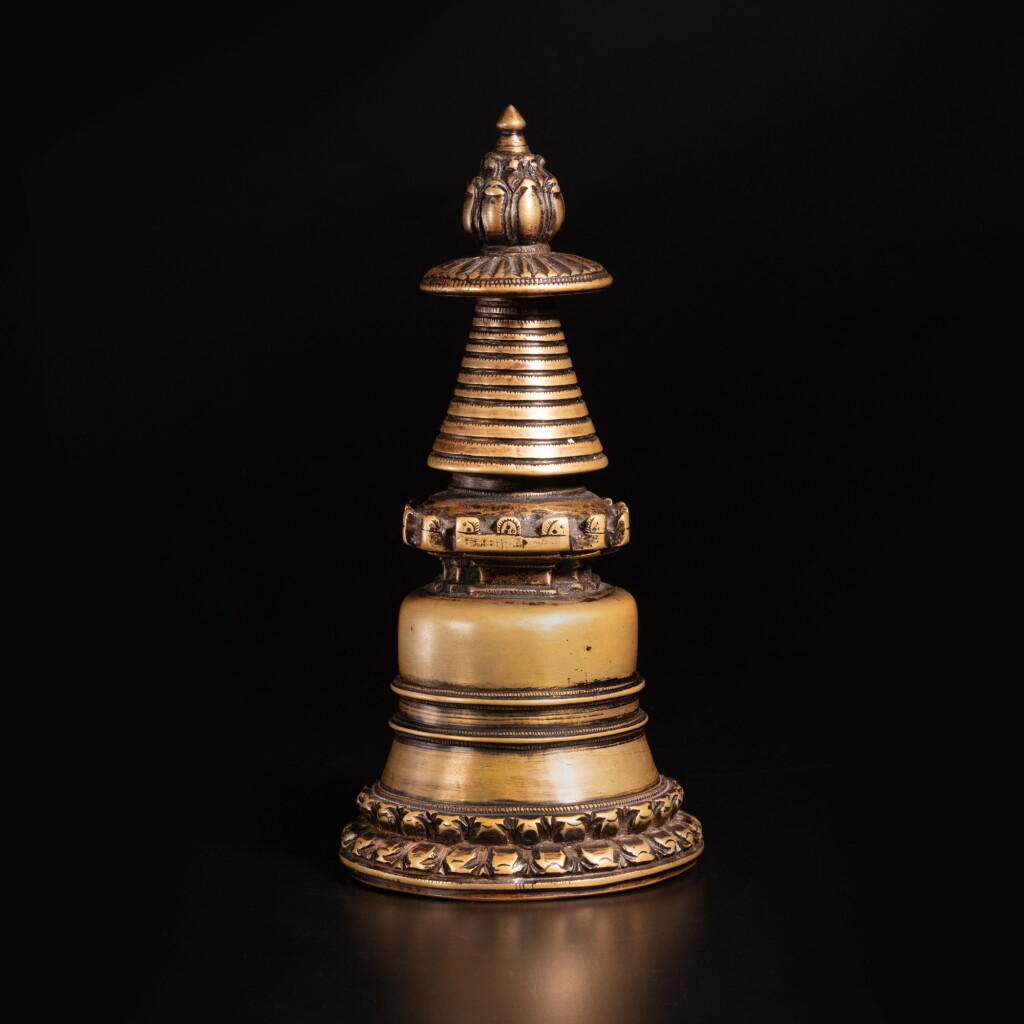 View full screen - View 1 of Lot 590. A copper alloy stupa, Tibet, circa 13th century.