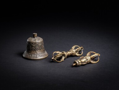 View full screen - View 1 of Lot 34. A bronze ritual bell, a bell handle and a bronze vajra, Tibet, 15th and 19th century .