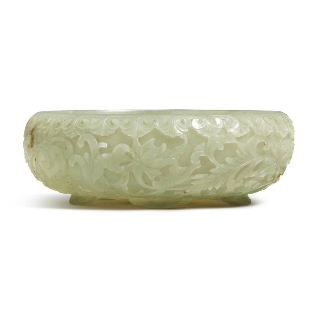 View full screen - View 1 of Lot 152. A Mughal-style celadon jade bowl, Qing dynasty, 18th / 19th century.