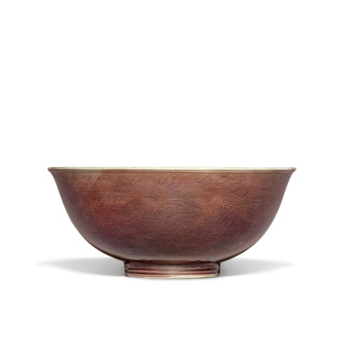 View full screen - View 1 of Lot 1311. An incised aubergine-glazed 'dragon' bowl, Qing dynasty, Daoguang period | 清道光 茄皮紫釉刻龍紋盌 .
