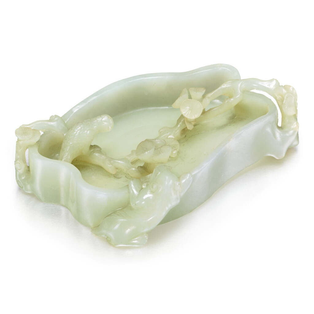 View full screen - View 1 of Lot 37. A celadon jade brush washer, Late Qing dynasty, circa 1900 | 清末 約1900年 青玉雕松枝瑞鳥紋洗.
