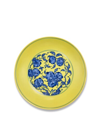 View full screen - View 1 of Lot 5103. A yellow-ground underglaze-blue 'nine peaches' dish, Seal mark and period of Qianlong | 清乾隆 黃地青花九桃紋盤 《大清乾隆年製》款.