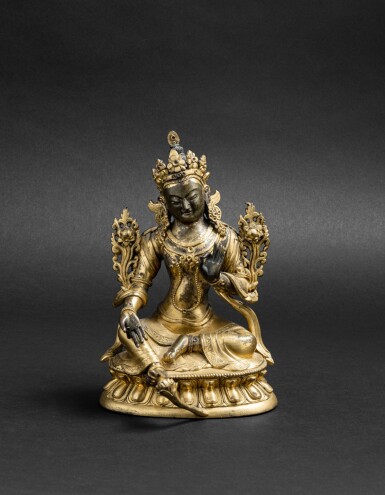 View full screen - View 1 of Lot 52. Statuette de Tara verte en bronze doré Dynastie Qing, XVIIIE-XIXE siècle | 清十八至十九世紀 鎏金銅綠度母坐像 | A gilt-bronze figure of the Green Tara, Qing Dynasty, 18th-19th century.
