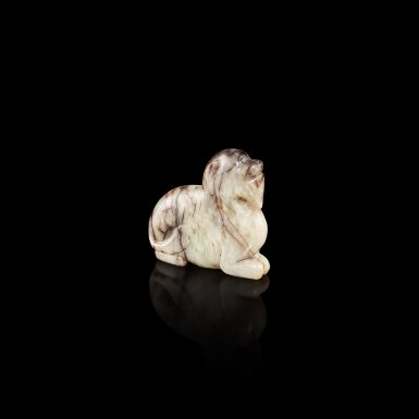 View full screen - View 1 of Lot 6902. A grey and brown jade figure of a mythical beast, Qing Dynasty | 清 灰玉瑞獸.