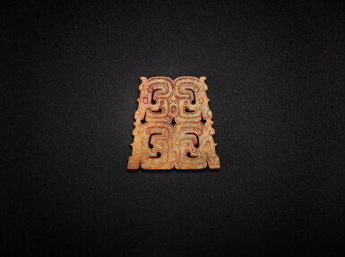 View full screen - View 1 of Lot 3810. A yellowish-celadon jade openwork 'human-dragon' plaque, Mid - late Western Zhou dynasty | 西周中晚期 淺青黃玉透雕人首龍紋項佩飾.