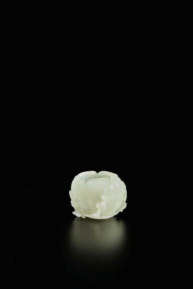 View full screen - View 1 of Lot 439. A small white jade magnolia-form water coupe, Qing dynasty, Qianlong period | 清乾隆 白玉雕玉蘭花式水盂.