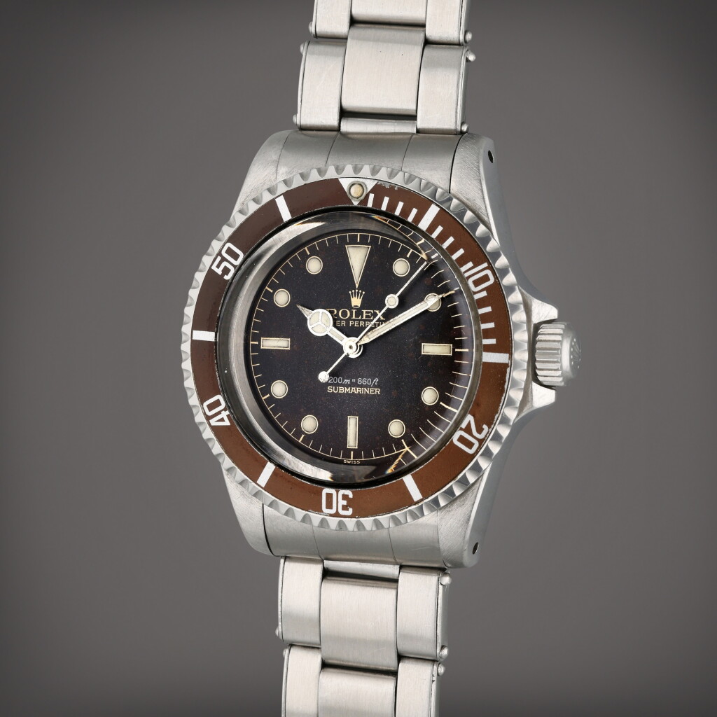View full screen - View 1 of Lot 510. Reference 5512 Submariner | A stainless steel wristwatch with bracelet with tropical dial, Circa 1961.