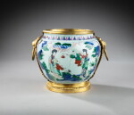 A Louis XV gilt-bronze mounted Chinese porcelain flower pot, the porcelain Kangxi period (1662-1722), the mounts circa 1750 | Cache-pot en porcelaine de Chine d’époque Kangxi (1662-1722), monture de bronze doré d’époque Louis XV, vers 1750