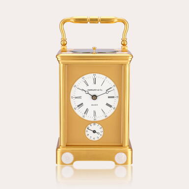 View full screen - View 1 of Lot 2102. A gilt brass and porcelain hour striking carriage clock with alarm, circa 1980.