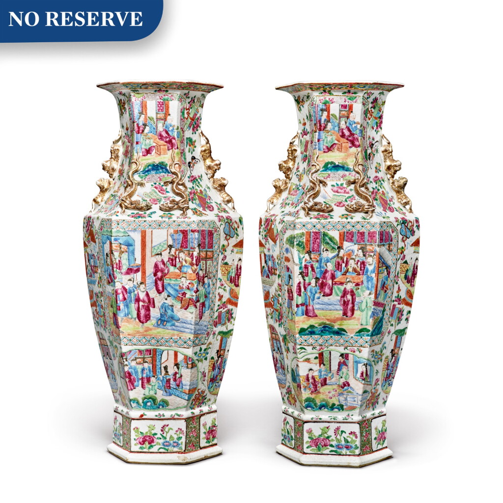 View full screen - View 1 of Lot 479. A Pair of Canton Famille-rose Hexagonal Baluster Vases, Qing Dynasty, Mid-19th Century | 清十九世紀中期 廣彩開光人物故事圖六方瓶一對.