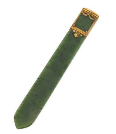 View full screen - View 1 of Lot 21. A Fabergé varicoloured gold-mounted nephrite letter-opener, workmaster Michael Perchin, St Petersburg, circa 1890.