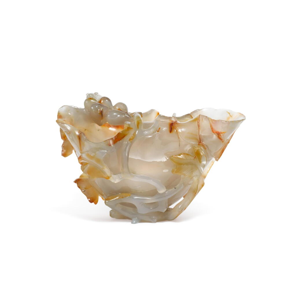 View full screen - View 1 of Lot 847. A carved agate ‘squirrel and grapes’ washer, Qing dynasty, 18th century | 清十八世紀 瑪瑙雕松鼠葡萄紋洗.