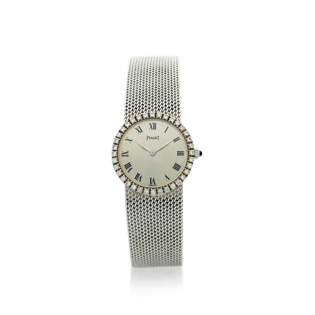 View full screen - View 1 of Lot 61. PIAGET | REFERENCE 926B11 A WHITE GOLD AND DIAMOND-SET BRACELET WATCH, CIRCA 1980.