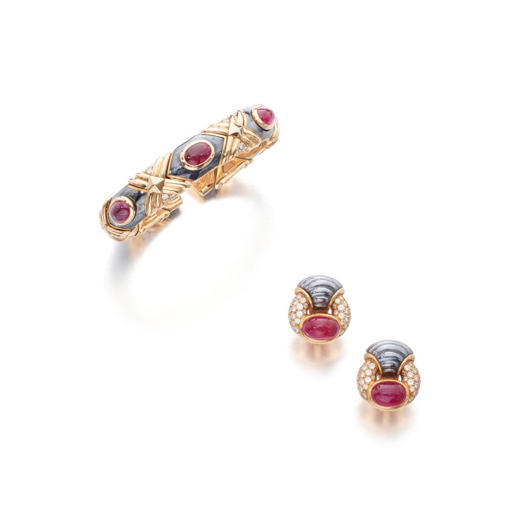 View full screen - View 1 of Lot 1002. Ruby, diamond, gold and steel demi-parure.