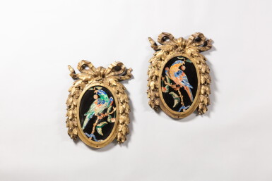 View full screen - View 1 of Lot 334. A pair of scagliola plaques, probably Italian 18th century in later gilt-bronze frames, 19th century | Paire de plaques au perroquet en scagliola et bronze doré, probablement Italie, XVIIIe siècle, les cadres XIXe siècle .