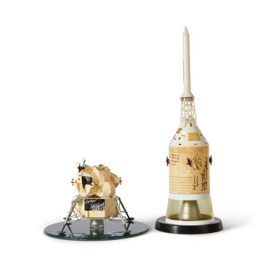 View full screen - View 1 of Lot 21. APOLLO SPACECRAFT CONTRACTORS MODELS. TWO MODELS (CSM AND LM), SIGNED BY 7 ASTRONAUTS.