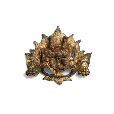 View full screen - View 1 of Lot 3612. A gilt-bronze 'beast mask' door knocker, Late Tang dynasty | 晚唐 銅鎏金鋪首.