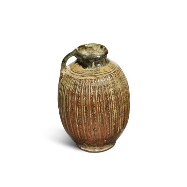 View full screen - View 1 of Lot 877. Fluted Jar with Handle.