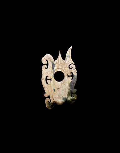 View full screen - View 1 of Lot 3761. A calcified jade ‘archer’s ring’ pendant, she, Han dynasty | 漢 玉韘式珮.