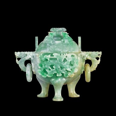 View full screen - View 1 of Lot 101. A jadeite tripod 'dragon' incense burner and cover | 翠玉巧作雲龍紋雙龍活環耳蓋爐.