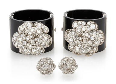 View full screen - View 1 of Lot 155. TWO RHINESTONE CUFFS AND A PAIR OF RHINESTONE EARCLIPS , CHANEL.