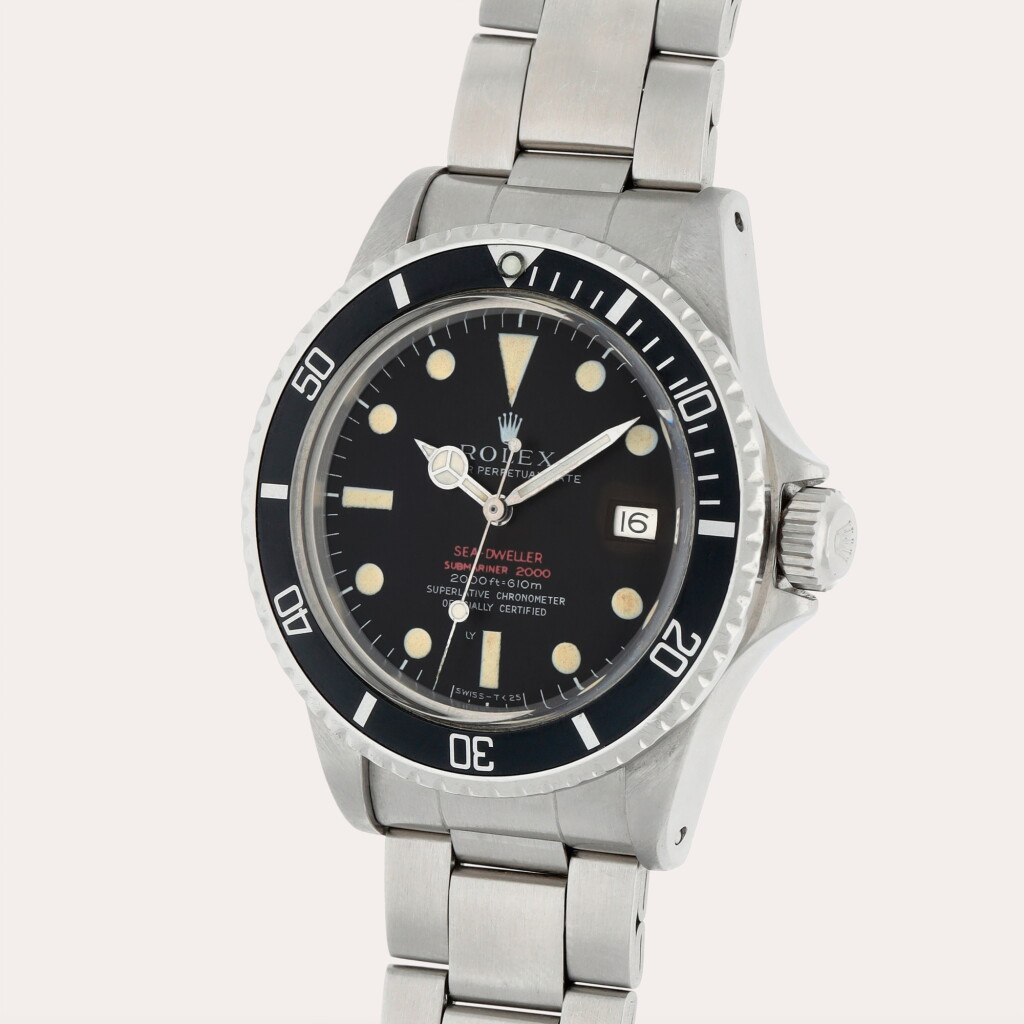 View full screen - View 1 of Lot 81. Sea-Dweller 'Double Red Patent Pending', Reference 1665 | A stainless steel wristwatch with tropical dial, date, bracelet and helium escape valve | Circa 1969.