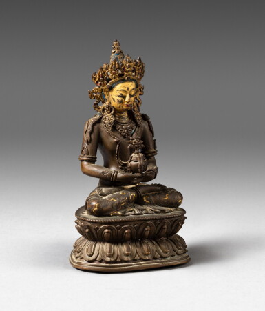 View full screen - View 1 of Lot 124. A Pala style parcel-gilt bronze figure of Amitayus Qing dynasty, 18th century | 清十八世紀 局部鎏金銅無量壽佛坐像.