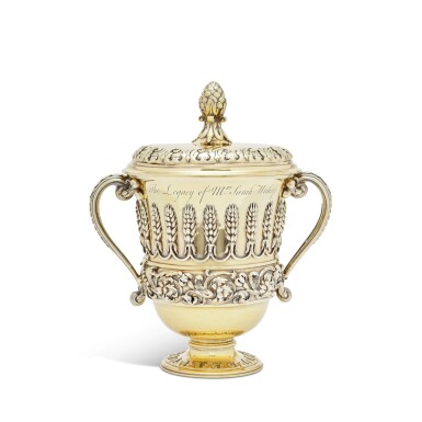 View full screen - View 1 of Lot 101. The Wahup Cup, A George II Silver-Gilt Cup And Cover, After Designs By William Kent, Elizabeth Godfrey, London, 1747.