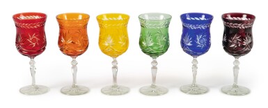 View full screen - View 1 of Lot 285. A BOHEMIAN HARLEQUIN SUITE OF COLORED AND CUT WINE GLASSES, LATE 19TH/ 20TH CENTURY.