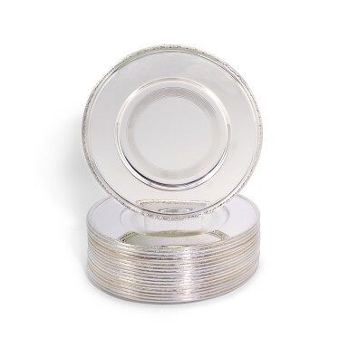 View full screen - View 1 of Lot 73. A set of 18 French silver chargers or underplates, Maison Christofle, Paris, post 1935.