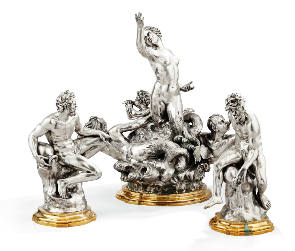 View full screen - View 1 of Lot 32. A SET OF THREE SILVER STATUES ON GILT BRONZE PEDESTALS, AVOLIO, NAPLES, CIRCA 1930 | ENSEMBLE DE TROIS STATUES EN ARGENT SUR SOCLES EN BRONZE DORÉ PAR AVOLIO, NAPLES, VERS 1930 .
